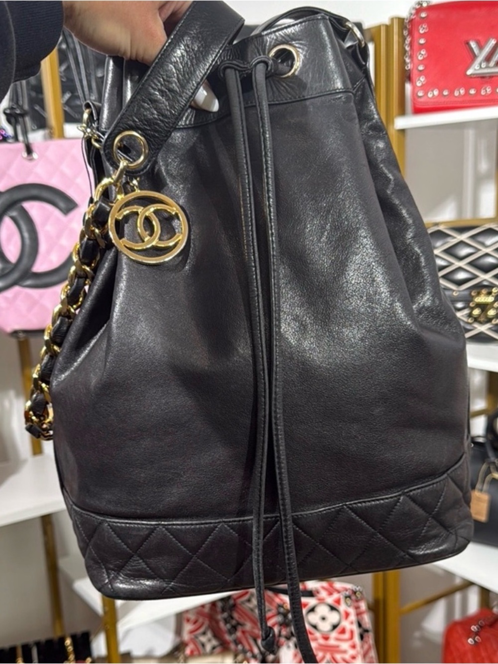 CHANEL Black Leather Bucket Bag with Gold Chain & CC Medallion
